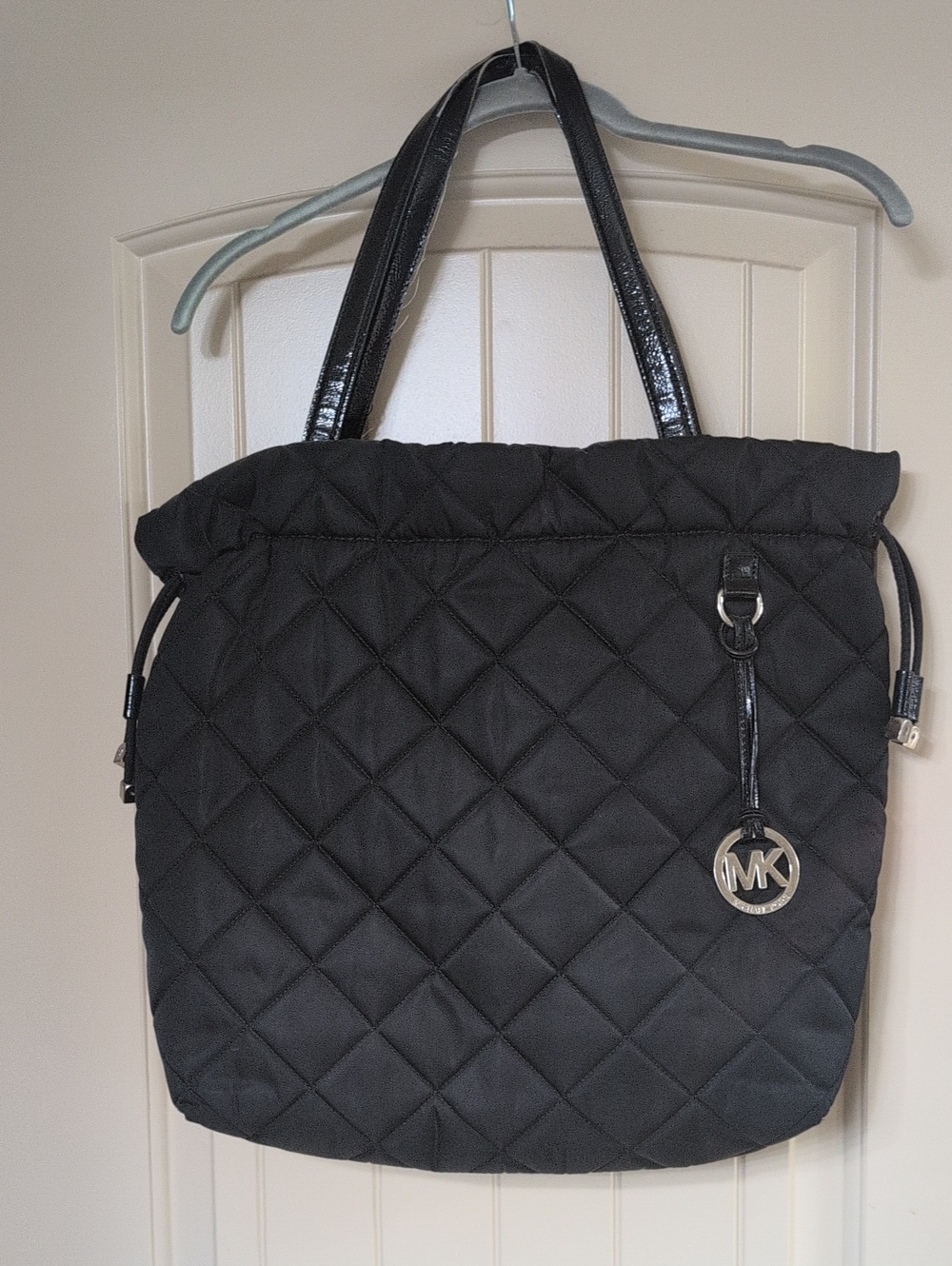 Michael Kors Black Quilted Tote with Silver MK Charm